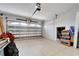 Attached garage with storage space and additional storage closet at 833 Bay Point Dr, Madeira Beach, FL 33708