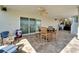 Covered patio with seating area and water views at 833 Bay Point Dr, Madeira Beach, FL 33708