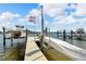 Convenient boat lift on private dock at 833 Bay Point Dr, Madeira Beach, FL 33708