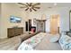 Spacious bedroom with ensuite bathroom access and water views at 833 Bay Point Dr, Madeira Beach, FL 33708