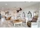 Open living room with high ceilings and neutral color scheme at 833 Bay Point Dr, Madeira Beach, FL 33708