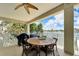 Enjoy waterfront views from this relaxing patio, complete with a dining table at 833 Bay Point Dr, Madeira Beach, FL 33708