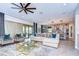 Open concept living room and kitchen with a large sectional sofa at 2924 Valencia Ridge St, Valrico, FL 33596