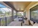 Relaxing screened lanai with outdoor seating and ceiling fan at 2924 Valencia Ridge St, Valrico, FL 33596