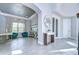 Bright and spacious entry with tile floors and modern decor at 2924 Valencia Ridge St, Valrico, FL 33596