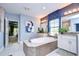 Bathroom with large soaking tub, double vanity and walk in shower at 2924 Valencia Ridge St, Valrico, FL 33596