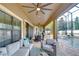 Relaxing pool area with covered patio and comfortable seating at 2924 Valencia Ridge St, Valrico, FL 33596