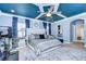Bedroom with king-size bed, stylish decor and access to bathroom at 2924 Valencia Ridge St, Valrico, FL 33596