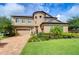 Two-story house with landscaped yard and brick driveway at 2924 Valencia Ridge St, Valrico, FL 33596