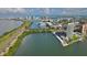 Aerial view of waterfront condo offering stunning coastal scenery and nearby city amenities at 31 Island Way # 907, Clearwater Beach, FL 33767