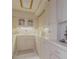 This well-maintained kitchen features light countertops and a large amount of storage space at 31 Island Way # 907, Clearwater Beach, FL 33767