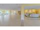 Expansive lobby with tile flooring and seating arrangements with water views at 31 Island Way # 907, Clearwater Beach, FL 33767