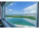 Picturesque view of the water and cityscape from the unit's window, offering scenic beauty at 31 Island Way # 907, Clearwater Beach, FL 33767