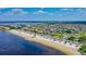 A scenic view of coastal homes nestled near a beautiful beach, with waterways enhancing the landscape at 4737 Casswell Dr, New Port Richey, FL 34652