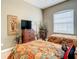 Bedroom featuring two beds, a dresser and a bright window at 4737 Casswell Dr, New Port Richey, FL 34652