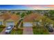 Charming homes featuring attached garages, paved driveways, and well-manicured landscaping at 4737 Casswell Dr, New Port Richey, FL 34652