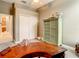 Home office features built-in closet and a curved wooden desk at 4737 Casswell Dr, New Port Richey, FL 34652