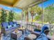 Relaxing screened porch with wicker furniture at 4737 Casswell Dr, New Port Richey, FL 34652