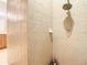 Large walk in shower with neutral tile at 4737 Casswell Dr, New Port Richey, FL 34652