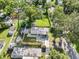 Aerial view of property with multiple mobile homes and fenced yard at 12501 Holyoke Ave, Tampa, FL 33624