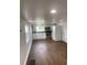 Modern kitchen with stainless steel appliances and white cabinets at 12501 Holyoke Ave, Tampa, FL 33624