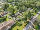 Aerial view of property with a mobile home and large yard at 12501 Holyoke Ave, Tampa, FL 33624