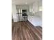 Modern kitchen with white cabinets and stainless steel appliances at 12501 Holyoke Ave, Tampa, FL 33624