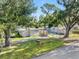 Aerial view of two mobile homes on a tree-lined street at 12501 Holyoke Ave, Tampa, FL 33624