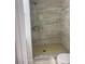 Clean bathroom with a shower stall and toilet at 12501 Holyoke Ave, Tampa, FL 33624