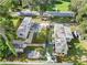 Aerial view of two mobile homes with fenced yards at 12501 Holyoke Ave, Tampa, FL 33624