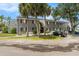 Gray condo building with parking and landscaping at 3822 Cortez Dr # D, Tampa, FL 33614