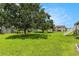 Community grounds with lush green lawn and mature trees at 3822 Cortez Dr # D, Tampa, FL 33614