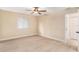 Spacious bedroom with large window and ceiling fan at 3822 Cortez Dr # D, Tampa, FL 33614