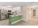 Modern kitchen featuring stainless steel appliances and green cabinets at 3822 Cortez Dr # D, Tampa, FL 33614