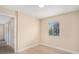 Simple bedroom with light walls and wood-look floors at 3822 Cortez Dr # D, Tampa, FL 33614