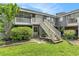 Exterior view showing stairs leading up to the condo building at 3822 Cortez Dr # D, Tampa, FL 33614