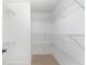Walk-in closet with wire shelving at 3822 Cortez Dr # D, Tampa, FL 33614