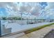White dock with seating and waterfront views at 31 Island Way # 907, Clearwater Beach, FL 33767