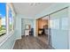 Small balcony area with a desk and access to a bedroom at 4550 Cove Cir # 501, St Petersburg, FL 33708
