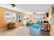Inviting living room featuring a view of the bay, neutral walls, and a mix of tile and wood flooring at 4550 Cove Cir # 501, St Petersburg, FL 33708