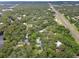 Aerial view of lush, green neighborhood featuring mature trees and easy highway access at 6924 Greenhill Pl, Tampa, FL 33617