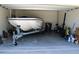 Garage with boat, bike, and additional storage space at 11919 Grand Kempston Dr, Gibsonton, FL 33534