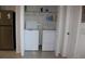 Convenient laundry room with washer and dryer in a closet at 11919 Grand Kempston Dr, Gibsonton, FL 33534