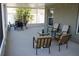 Large screened patio with seating for relaxing and entertaining at 11919 Grand Kempston Dr, Gibsonton, FL 33534