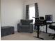 Home office featuring comfortable seating and a standing desk at 11919 Grand Kempston Dr, Gibsonton, FL 33534