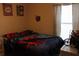 Bedroom with Spiderman themed bedding and decor at 11919 Grand Kempston Dr, Gibsonton, FL 33534