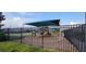 Modern playground with protective fencing at 11919 Grand Kempston Dr, Gibsonton, FL 33534