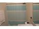 Bathroom with shower/tub combo and vanity with granite countertop at 11919 Grand Kempston Dr, Gibsonton, FL 33534