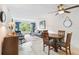 Bright dining area with a round table and four chairs at 12760 Indian Rocks Rd # 910, Largo, FL 33774