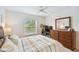 Bedroom with a comfortable bed and built-in desk at 12760 Indian Rocks Rd # 910, Largo, FL 33774
